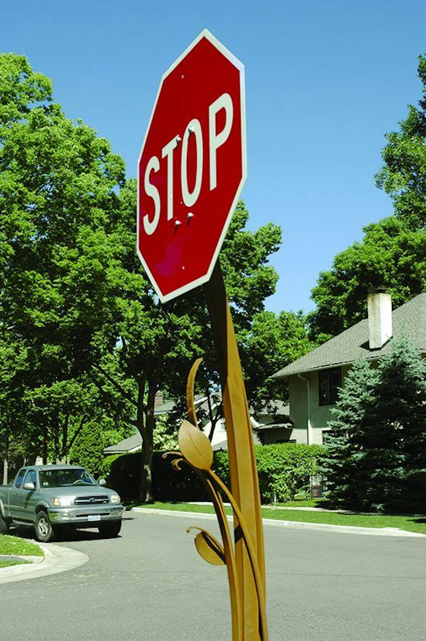 One of the new artsy stop signs recently erected in St. Paul.