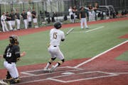 Drake Siens still had his bat in hand moments after launching a solo homer on Sunday against St. Olaf.