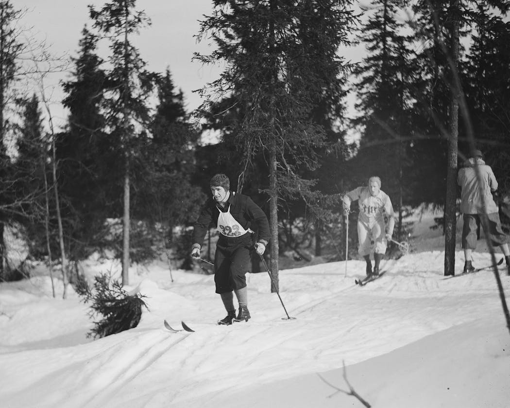 Magnar Fosseide, cousin to famed Duluth skier Peter Fosseide, glides through wooded trails during a Norwegian competition in 1938.