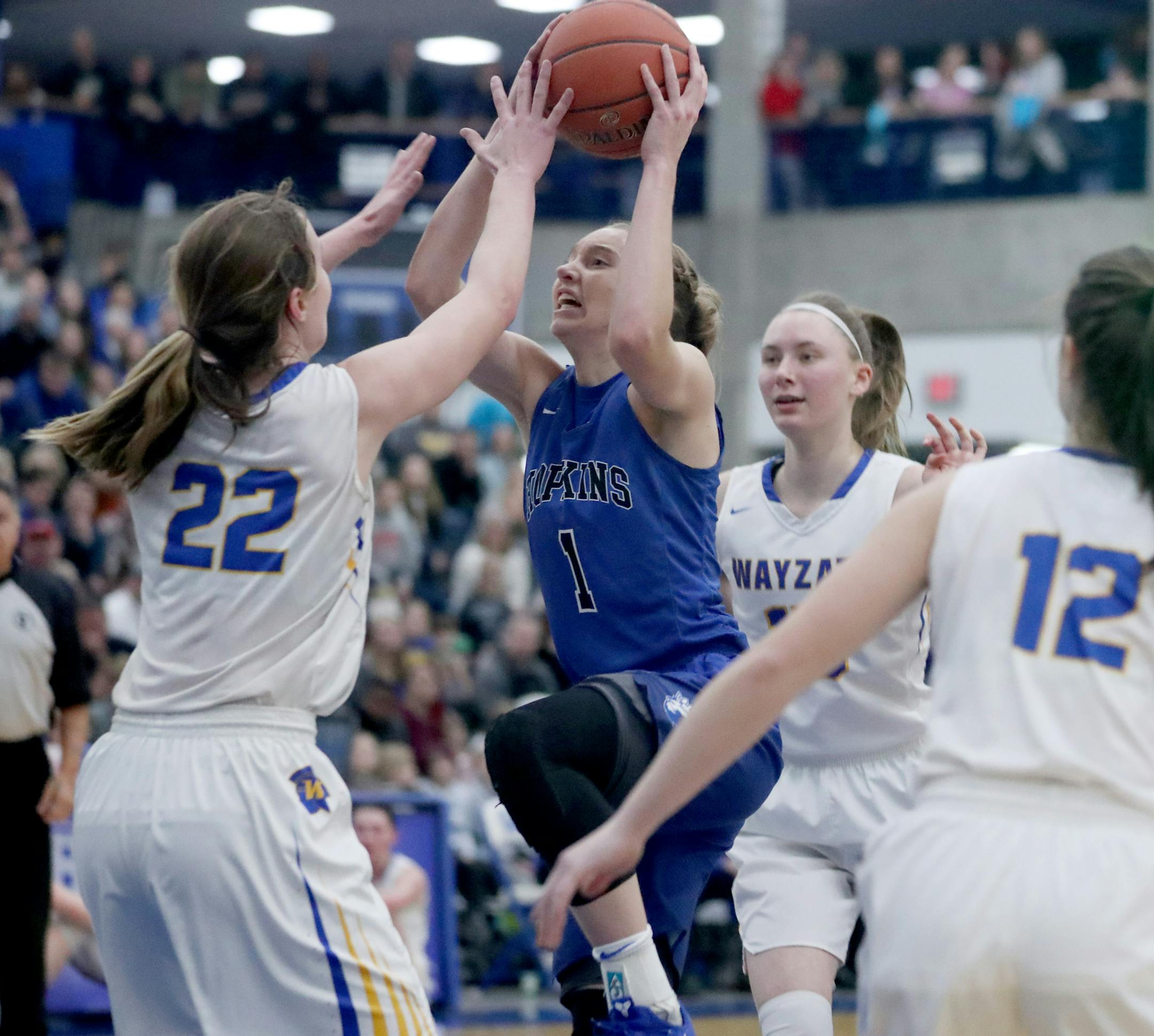 Hopkins Paige Bueckers (1) owned the night, leading her team to a 69-66 win over Wayzata while reaching 2000 high school career points as a junior, and seen driving towards the basket during the second half Friday, Feb. 1, 2109, at Hopkins High in Minnetonka, MN] DAVID JOLES •david.joles@startribune.com Hopkins-Wayzata girls