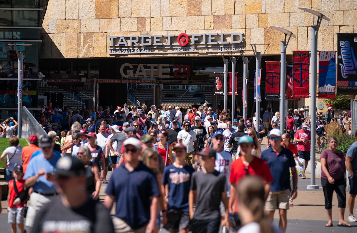 Fans leave Target Field after a Twins game Wednesday, August 3, 2022 in Minneapolis. ]