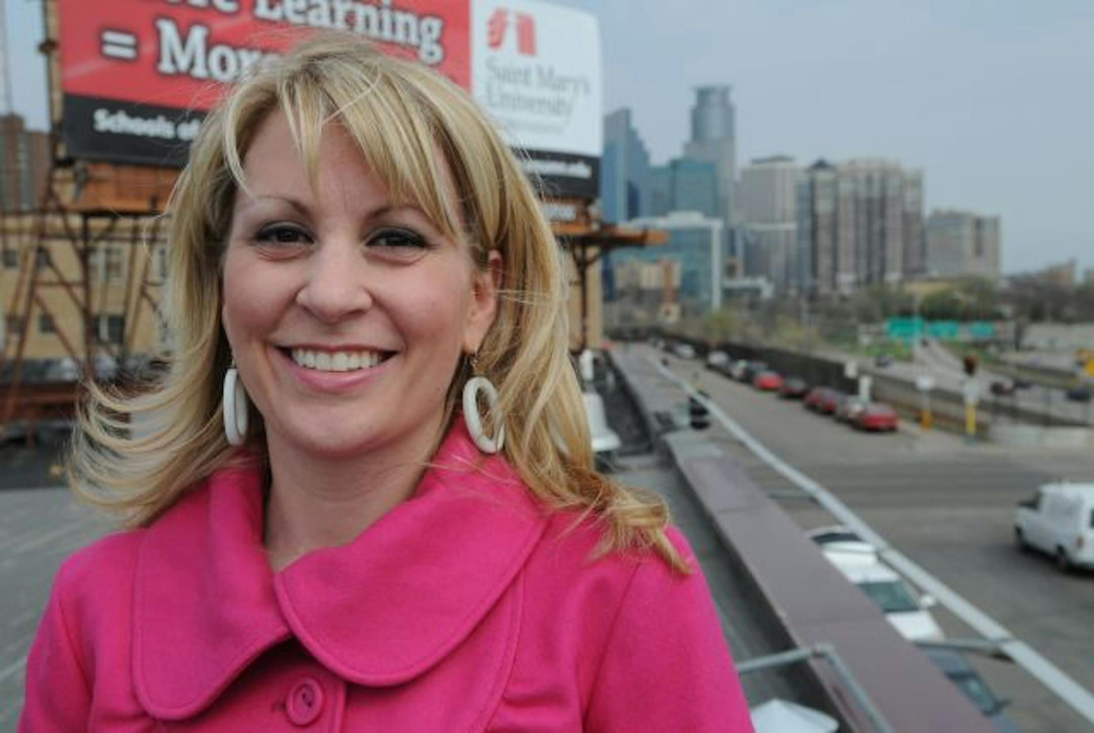 Minneapolis Mn. Monday 4/12/10 Stephanie Covar-Meyerring co-owner of the Electric Fetus stands on the roof of the store which sustained $1 million in damage in a "weak" tornado last August. By coincidence, the final phase of repairs -- to the roof -- begin Monday April 19, first day of Severe Weather Awareness Week. During the tornado the wind ripped up the roof of in sections.