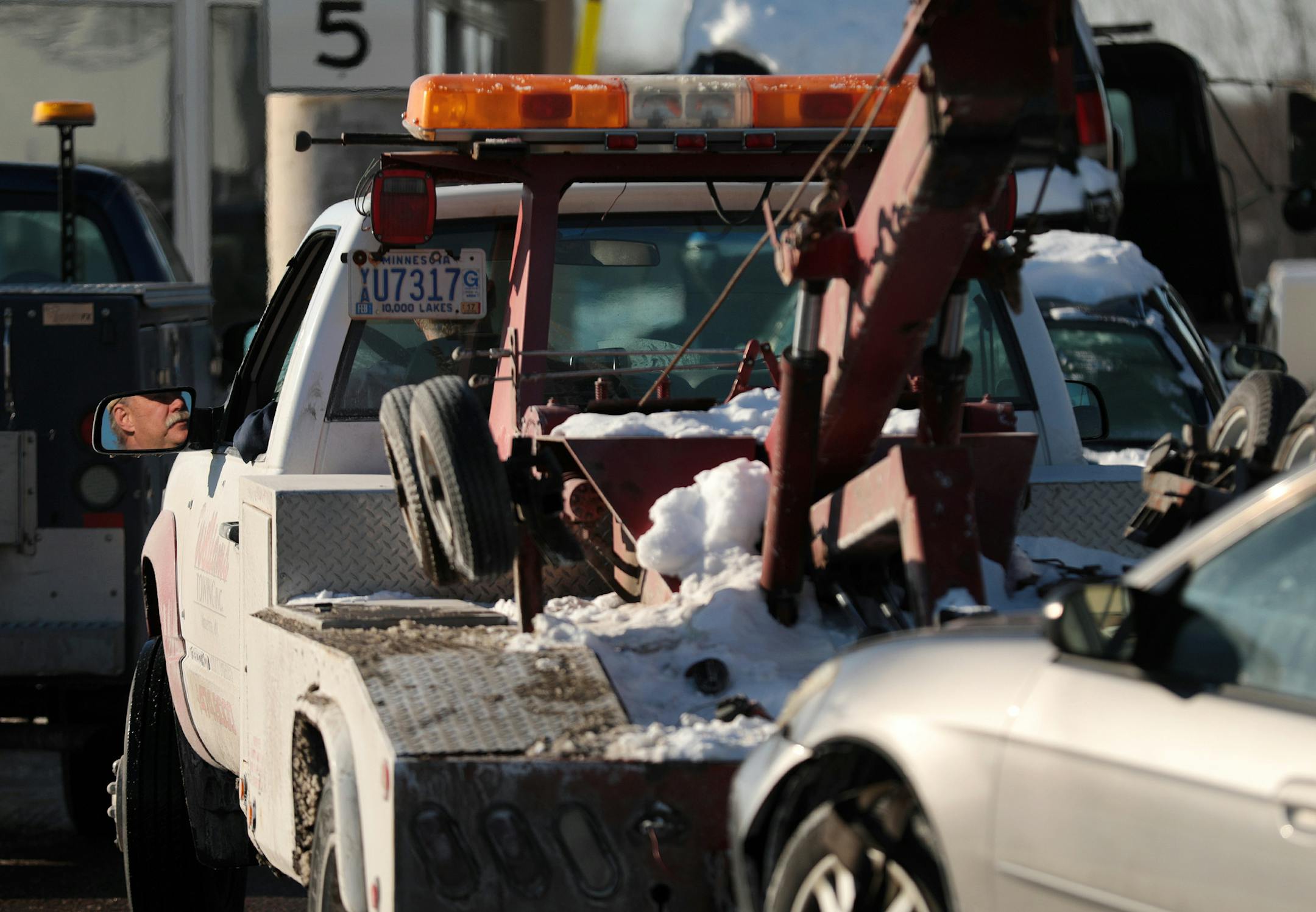 A towed car is just one of the issues a driver may face after an accident.