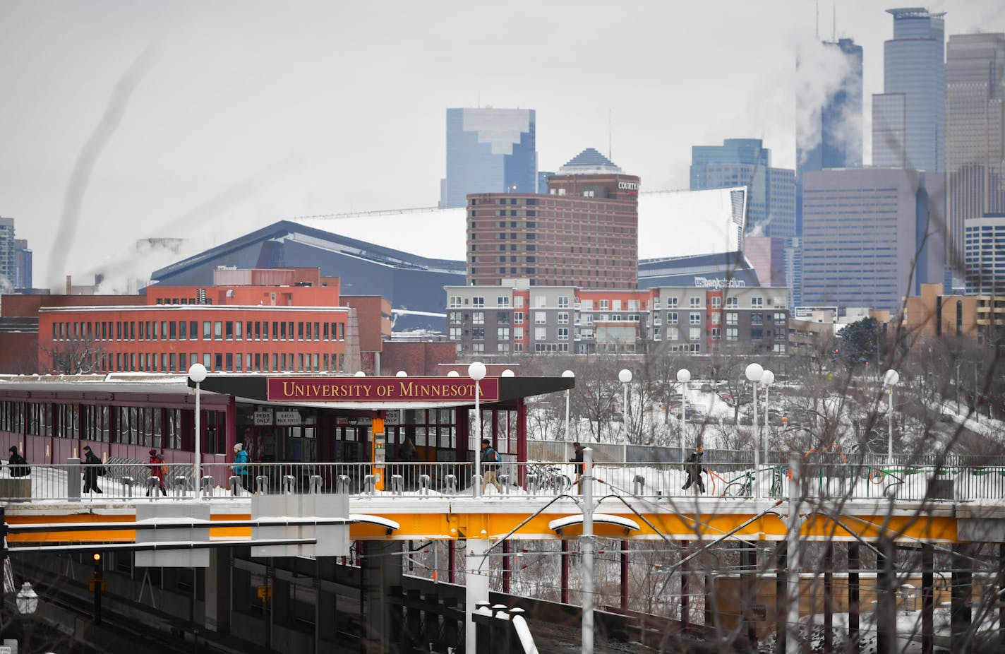 Minneapolis is blanketed in a fresh coat of snow as temperatures drop to single digits (and below zero overnight Saturday.)