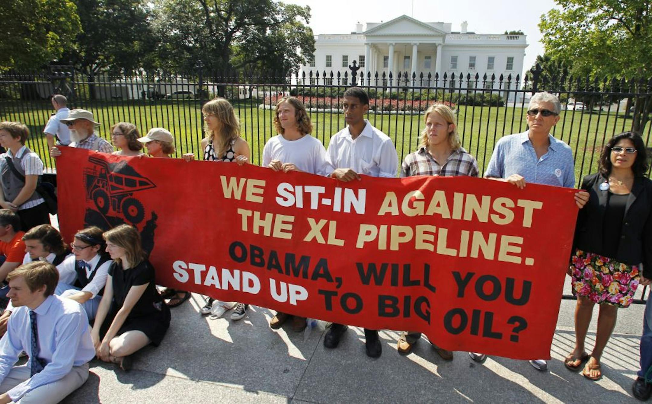 File photo: Protestors over a proposed pipeline to bring tar sands oil to the U.S. from Canada, gather in front of the White House.