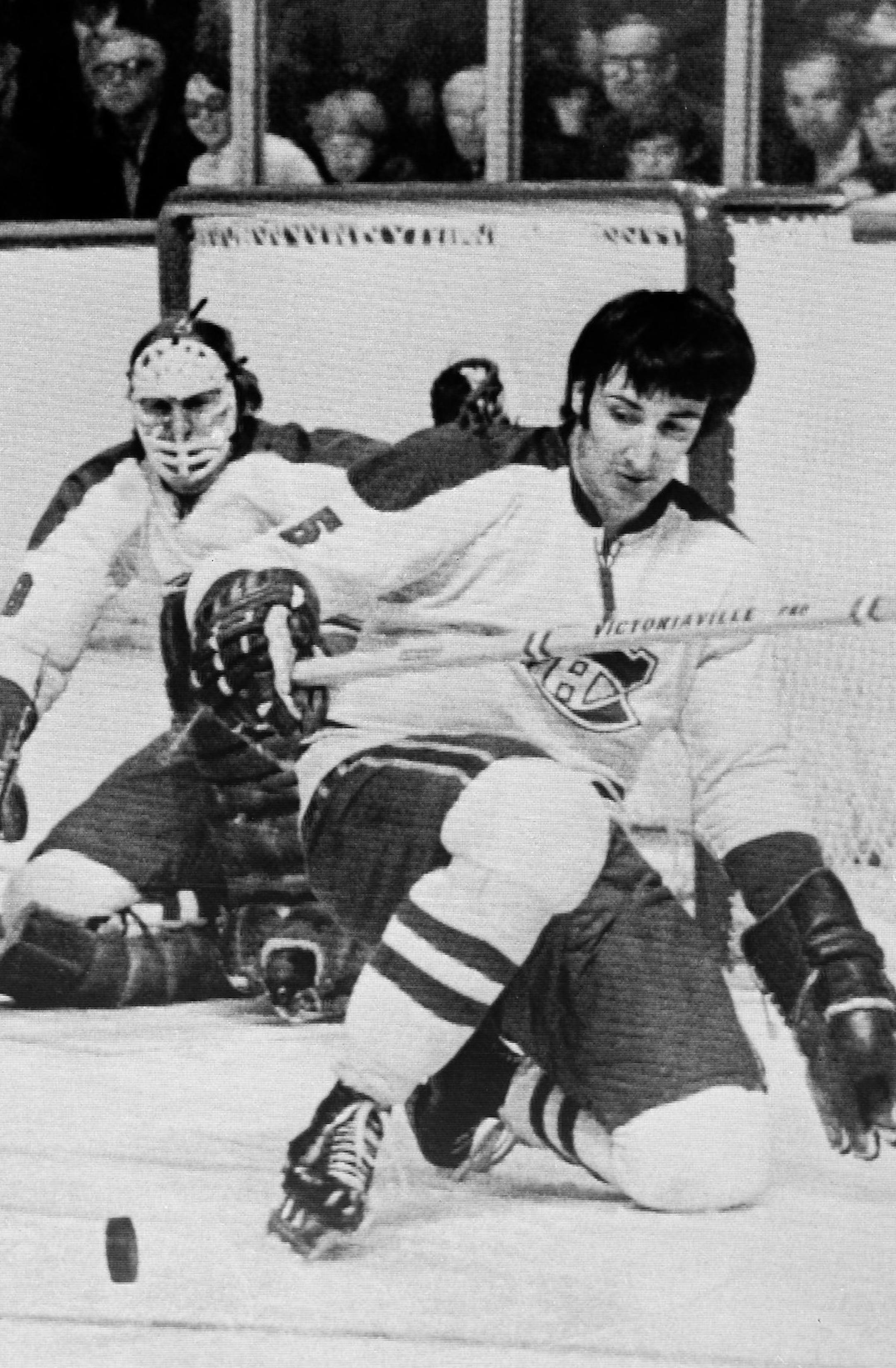 Montreal Canadiens' Guy LaPointe manages to stave a shot from Black Hawks' Jim Pappin with his skate in front of goaler Ken Dryden during during first period action of the Stanley Cup playoffs in Montreal, Canada, Sunday May 16, 1971. (AP Photo) ORG XMIT: APHS45403