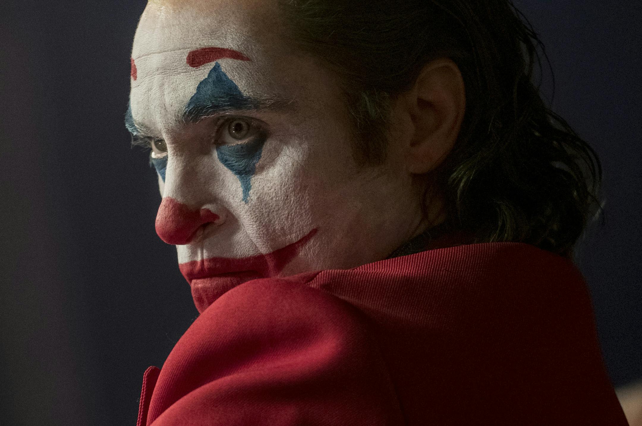 This image released by Warner Bros. Pictures shows Joaquin Phoenix in a scene from "Joker," in theaters on Oct. 4. Alarmed by violence depicted in a trailer for the upcoming movie “Joker,” some relatives of victims of the 2012 Aurora movie theater shooting asked distributor Warner Bros. on Tuesday to commit to gun control causes. Twelve people were killed in the suburban Denver theater during a midnight showing of the Batman film, “The Dark Knight Rises,” also distrib