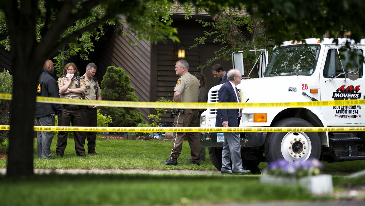 Scene in front of a single family home at 5977 Grotto St. N, Shoreview where two people were shot and killed Tuesday, June 4, 2013 ] GLEN STUBBE * gstubbe@startribune.com