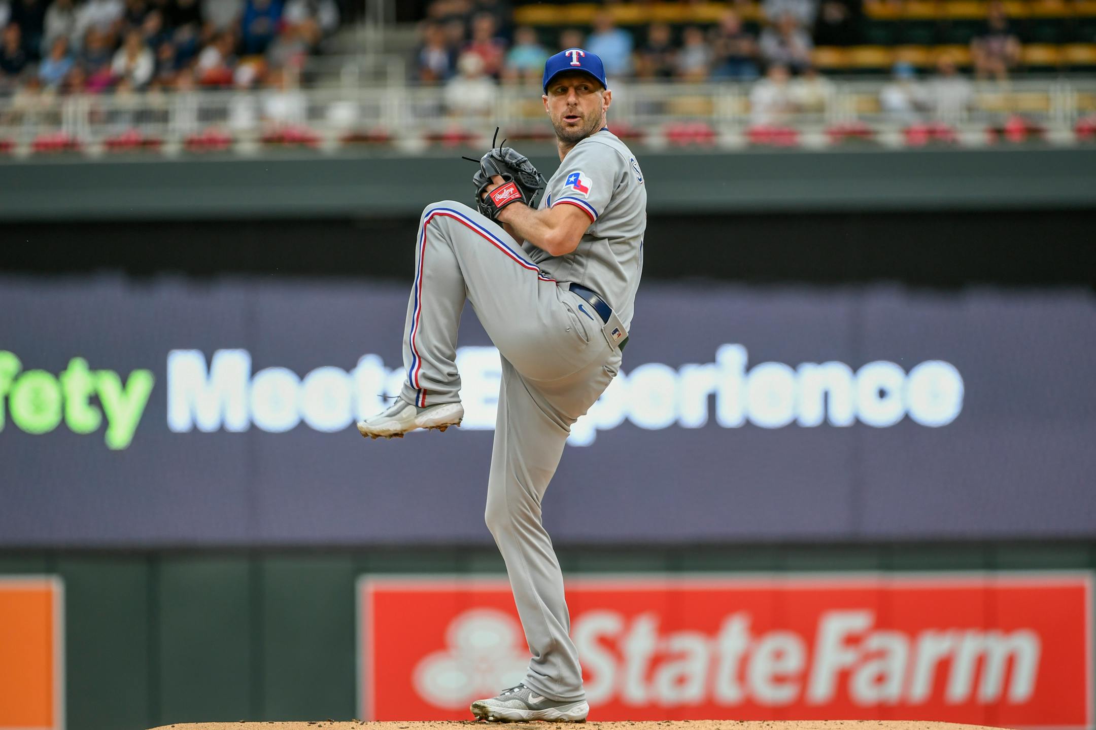 Texas Rangers pitcher Max Scherzer winds up during the first inning of the team's baseball game against the Minnesota Twins, Saturday, August 26, 2023, in Minneapolis. (AP Photo/Craig Lassig)