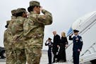 President Joe Biden and first lady Jill Biden arrive at Dover Air Force Base in Delaware on Friday to witness the transfer of the remains of three U.S