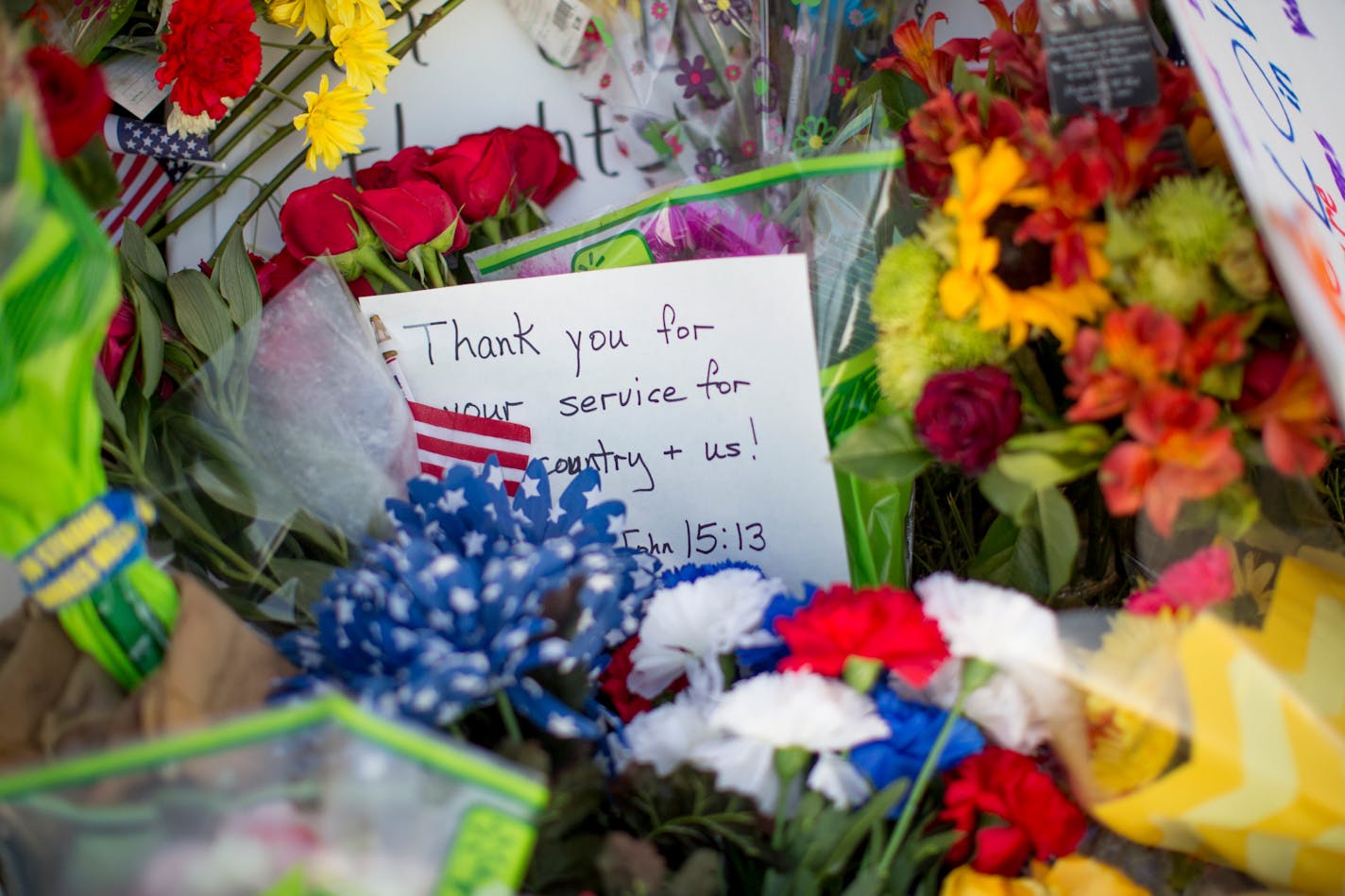 A makeshift memorial near a military recruiting center where a gunman opened fire the day before, on Lee Highway in Chattanooga, Tenn., July 17, 2015.