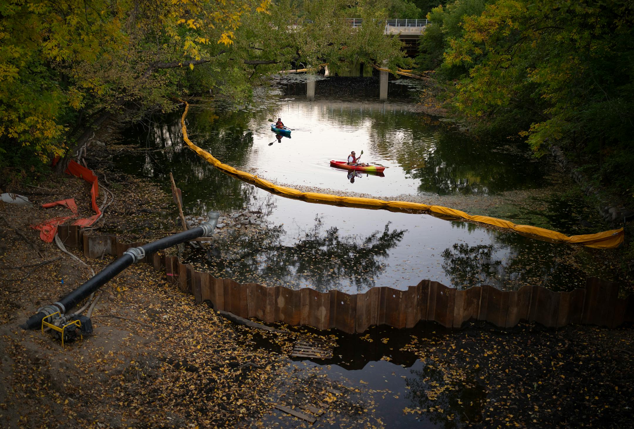 The temporary dam that is holding back the water on either end of the Kenilworth Channel. Water is being pumped out to allow work on the project to naturalize and stabilize the shoreline.