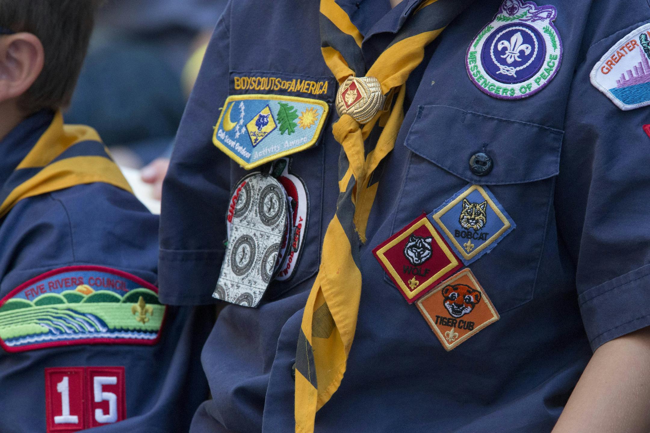In this Saturday, June 25, 2016 photo, Cub Scouts watch a race during the Second Annual World Championship Pinewood Derby in New York's Times Square. Nearly 12 months after the Boy Scouts of America National Executive Board's decision to end a long-standing blanket ban on participation by openly gay adults, the Boy Scouts seem more robust than they have in many years. (AP Photo/Mary Altaffer)
