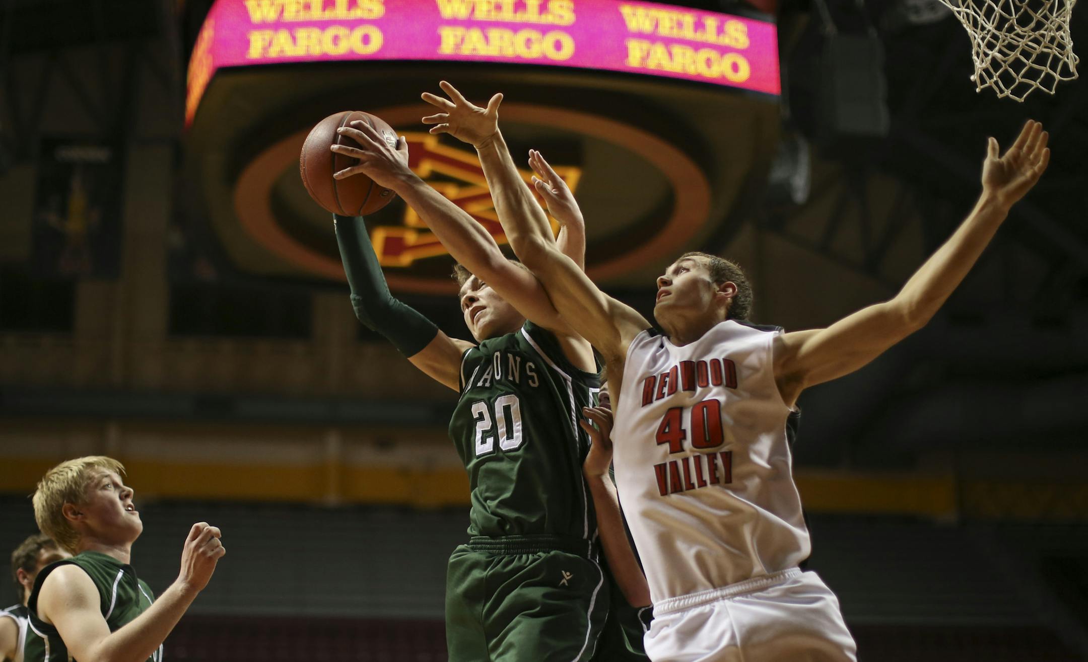 Litchfield outlasted Redwood Valley, Redwood Falls 64-55 in two overtimes to win their Class 2A Boys' Basketball State Tournament quarterfinal game Wednesday night, March 20, 2013 at Williams Arena in Minneapolis. Litchfield's Zach Kinny snared a second half defensive rebound ahead of Redwood Valley, Redwood Falls' R.J. Juell. ] JEFF WHEELER ‚Ä¢ jeff.wheeler@startribune.com