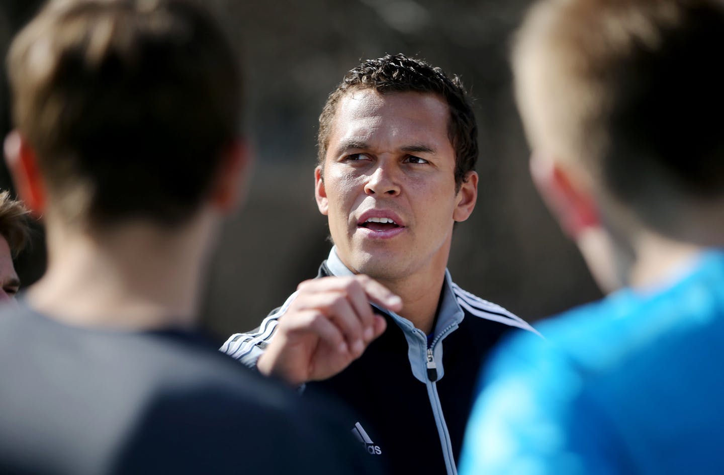 Former Washburn tennis player, NFL wide receiver and contestant on The Bachelorette, Ryan Hoag, has revived a boys' tennis program at Washburn that was almost dormant when he took over seven years ago. Here, Hoag gives his players instructions near the start of practice at Morgan Park Friday, April 10, 2015, in Minneapolis, MN.](DAVID JOLES/STARTRIBINE)djoles@startribune.com Former Washburn tennis player, NFL wide receiver and contestant on The Bachelorette, Ryan Hoag, has revived a boys' tennis