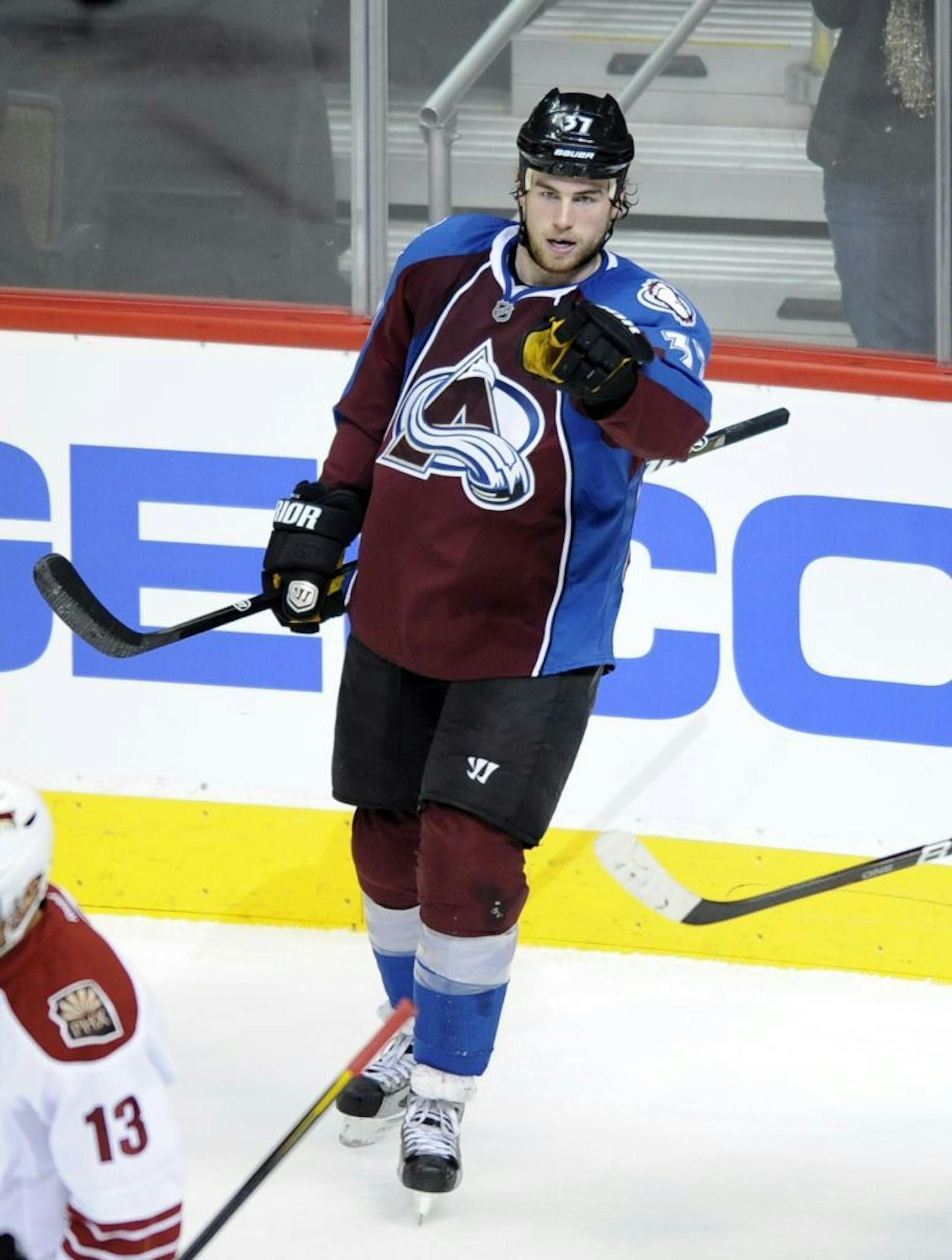 Colorado Avalanche center Ryan O'Reilly (37) celebrates a goal against the Phoenix Coyotes during the second period of an NHL hockey game Wednesday, Nov. 2, 2011, in Denver.