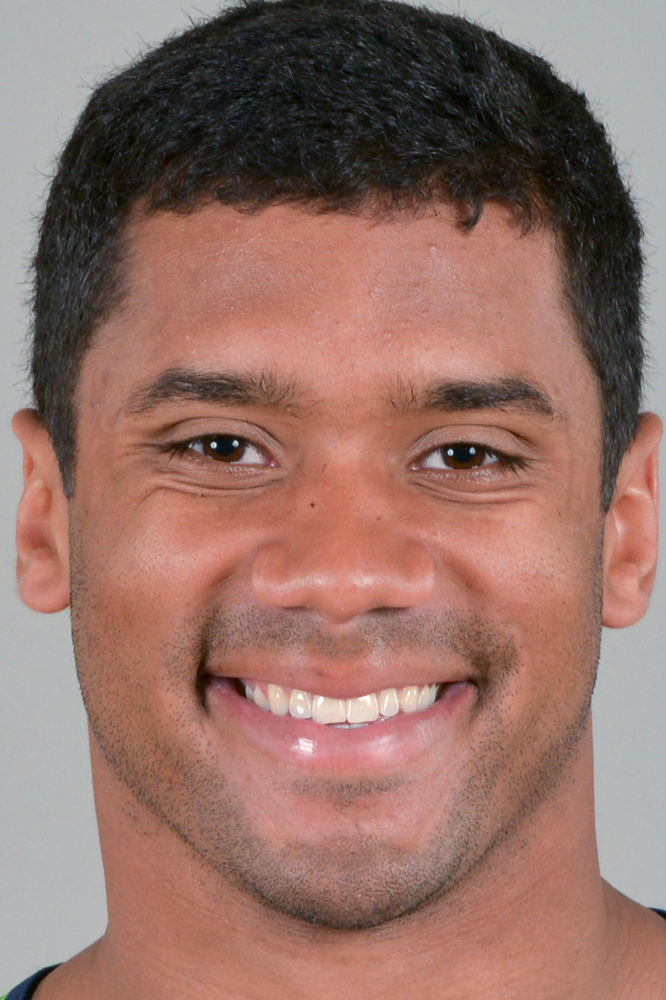 This is a 2013 photo of Russell Wilson of the Seattle Seahawks NFL football team. This image reflects the Seattle Seahawks active roster as of Wednesday, May 29, 2013 when this image was taken. (AP Photo) ORG XMIT: NFLHS13