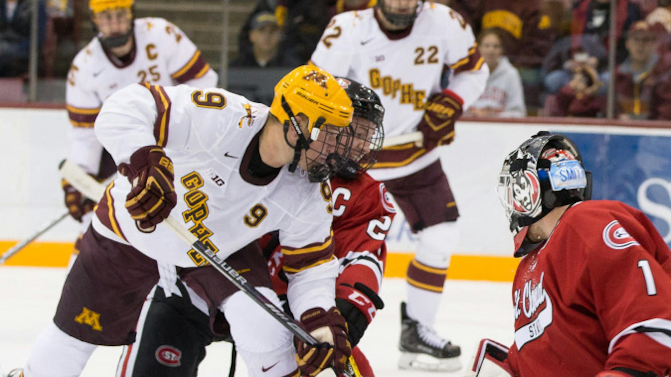 Gophers forward Mike Szmatula (No. 9, shown during an October 14 nonconference game against St. Cloud State) scored one goal and assisted on another in the final minute of regulation after the Gophers pulled their goalie for an extra attacker to salvage a 2-2 overtime tie against St. Lawrence on Saturday night. For more Gophers photos, go to www.gophersports.com.