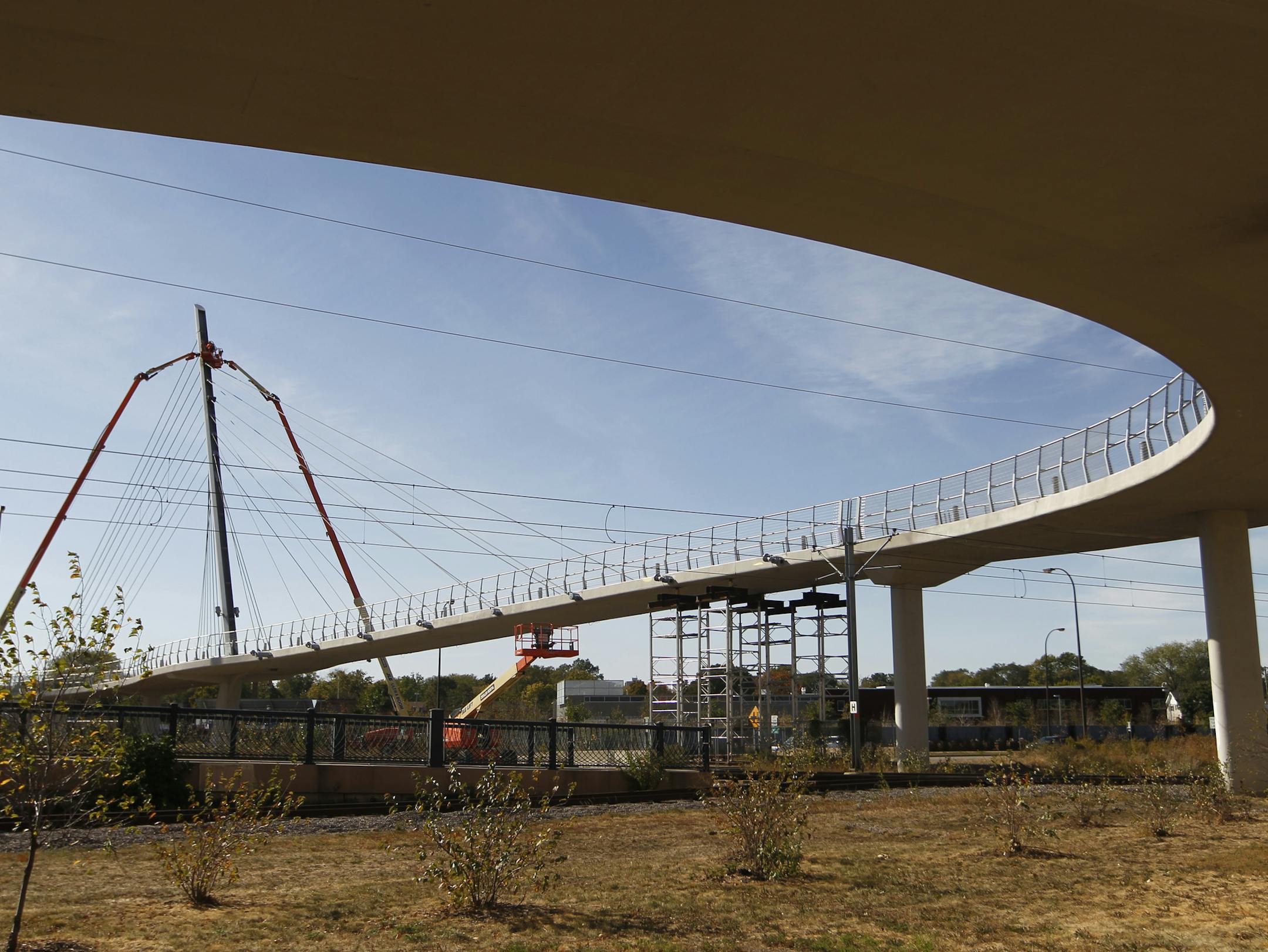 Bicycle traffic will be closed on the Sabo Bridge until repairs which began today are completed in early December .] rtsong-taatarii@startribune.com