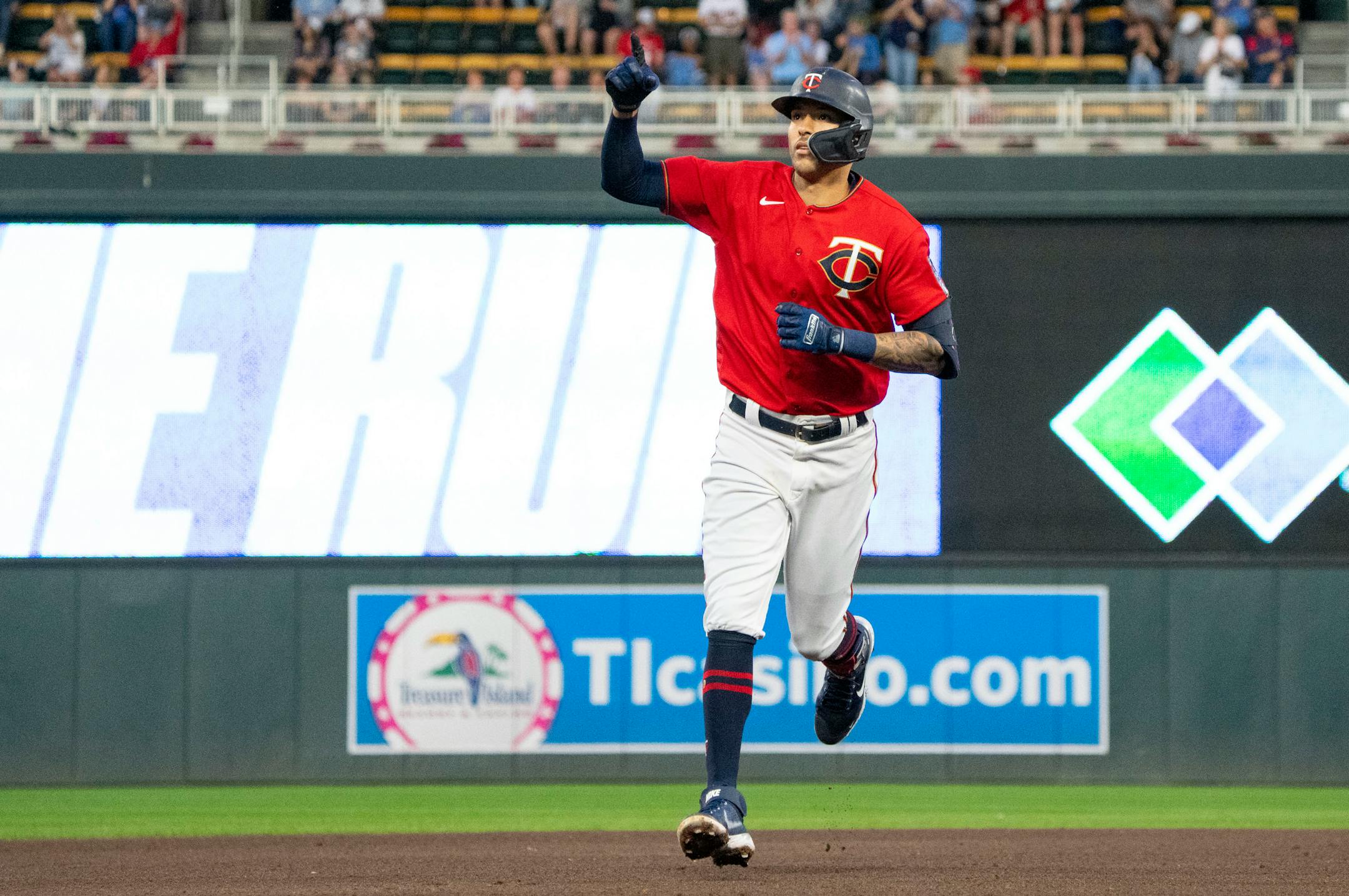 Minnesota Twins shortstop Carlos Correa (4) rounds second after hitting a home run in the fourth inning.