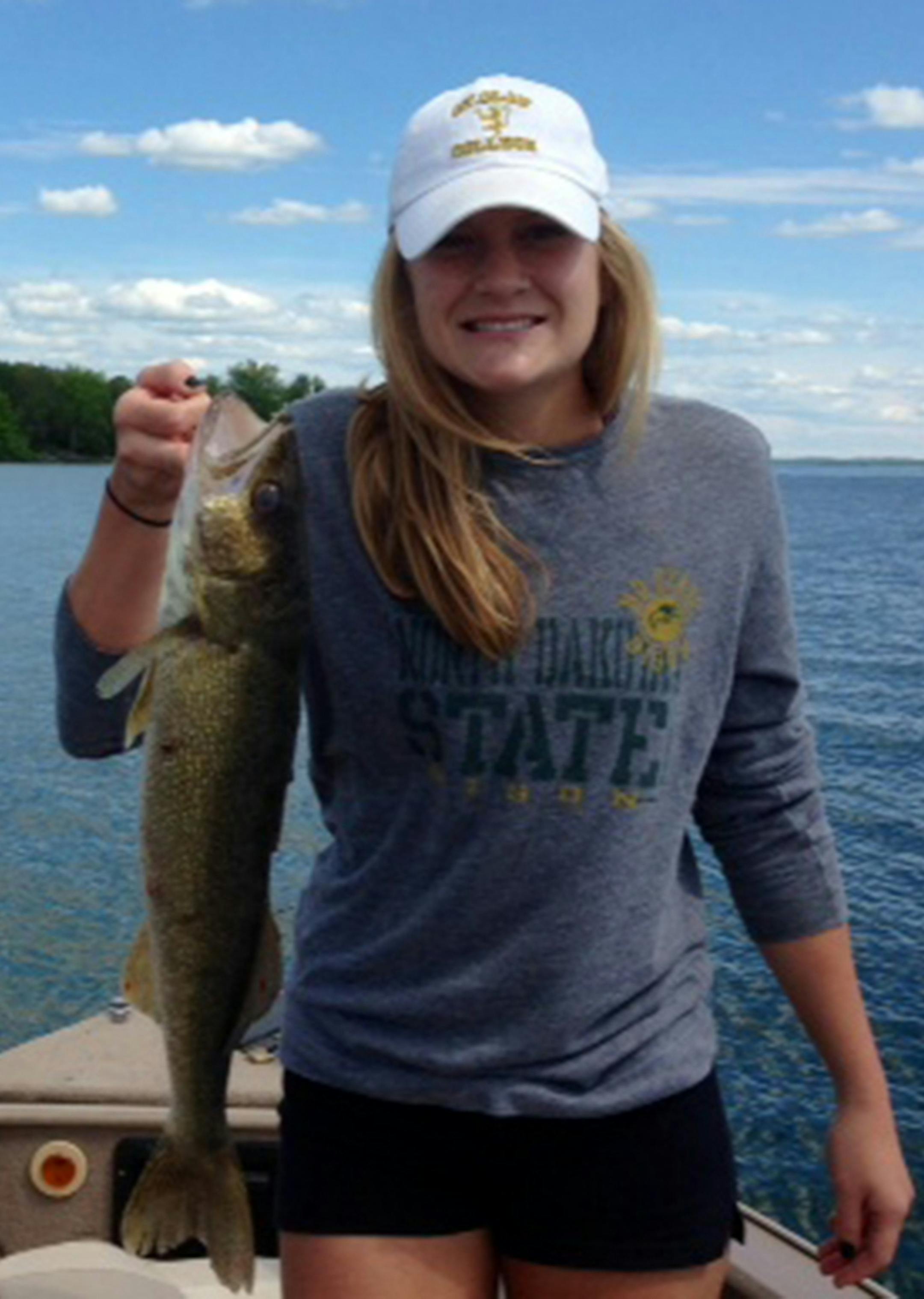 FIRST WALLEYE Jamie Kulla of Lakeville caught her first walleye -- a 23- incher -- on Leech Lake while fishing with her dad.