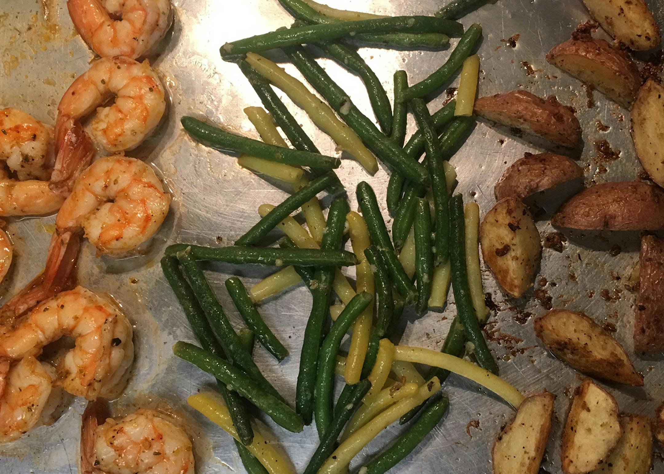This sheet-pan dinner includes shrimp, green beans and potatoes. (Susan Selasky/Detroit Free Press/TNS) ORG XMIT: 1279221