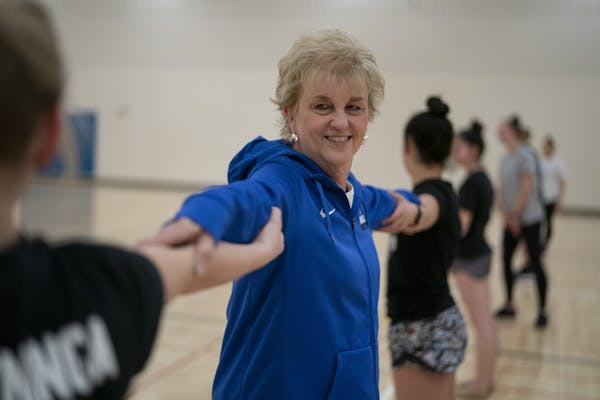 Wayzata coach Leslie Swiggum joined in with her dance team at a recent practice at the high school.