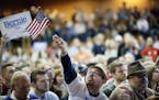 Christopher Krauss of Rochester waved an American flag during a rally for Sen. Bernie Sanders at the American Indian Center Sunday May 31, 2015 in Min