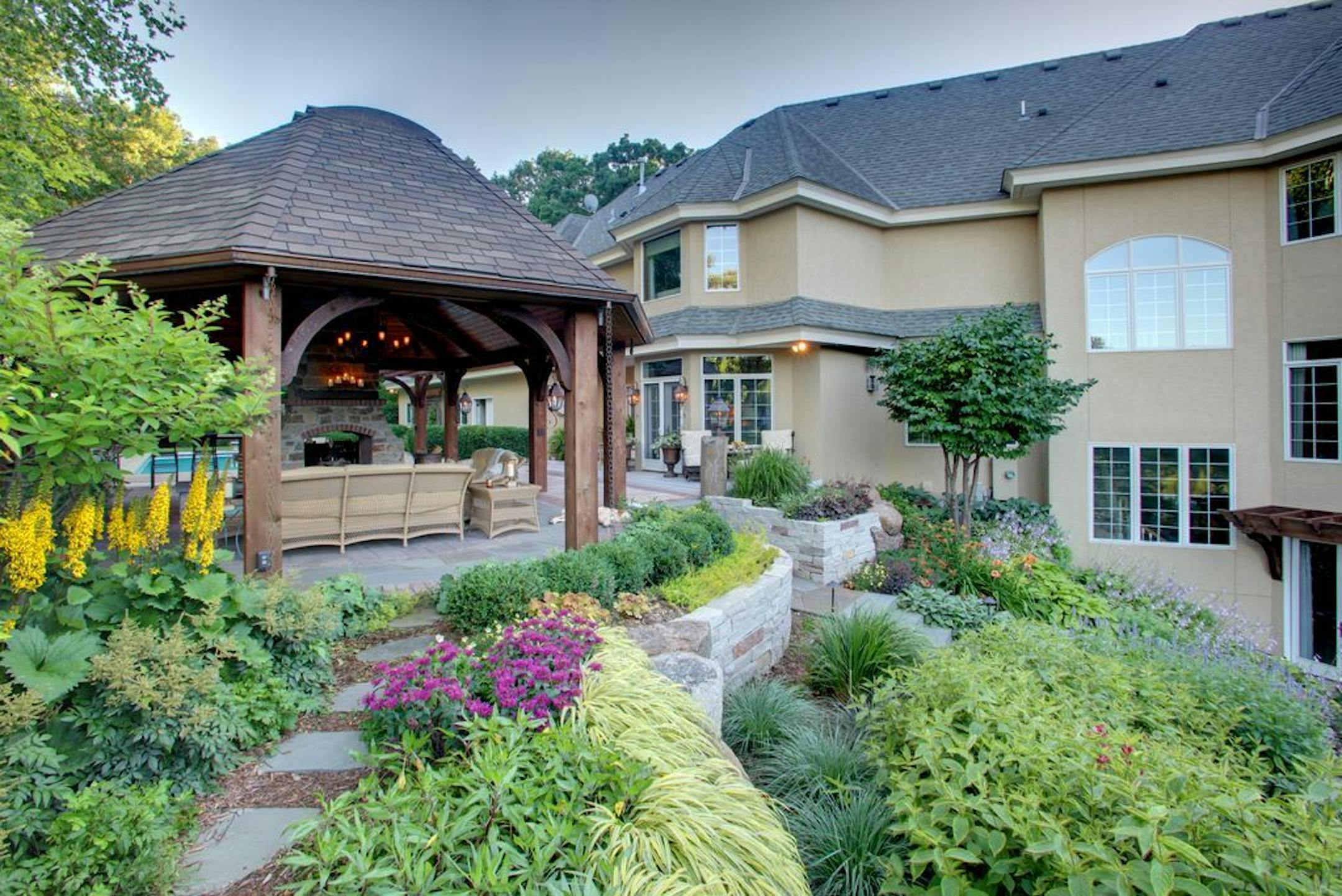More than 100 varieties of plantings, mostly perennials, complement the outdoor spaces.