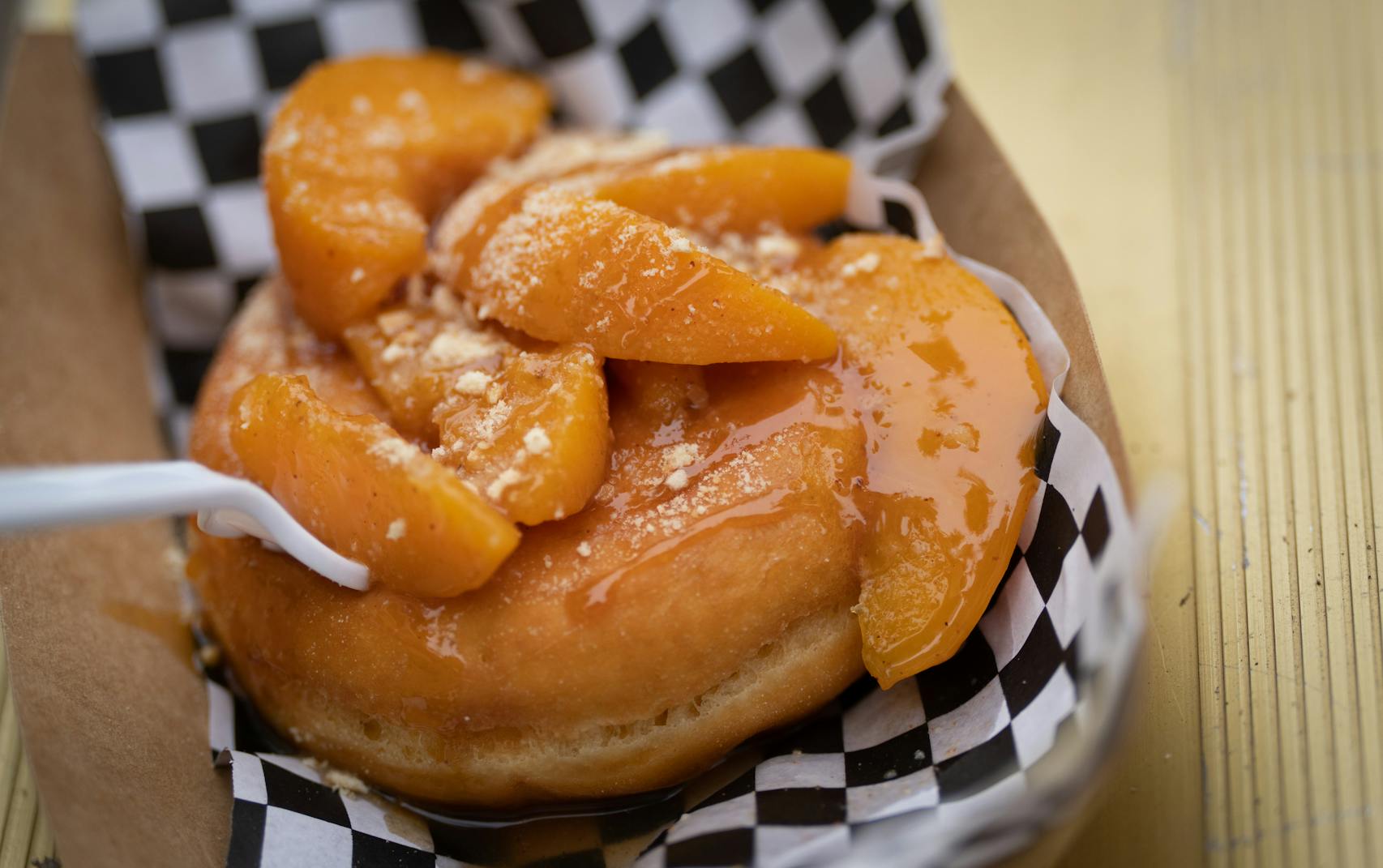 Donut Peach Cobbler from Soul Bowl. New foods at the Minnesota State Fair photographed on Thursday, Aug. 25, 2022 in Falcon Heights, Minn. ] RENEE JONES SCHNEIDER • renee.jones@startribune.com
