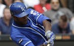 CORRECTS TO SECOND INNING NOT FIRST Kansas City Royals' Lorenzo Cain hits a two RBI single against the Chicago White Sox during the second inning of a