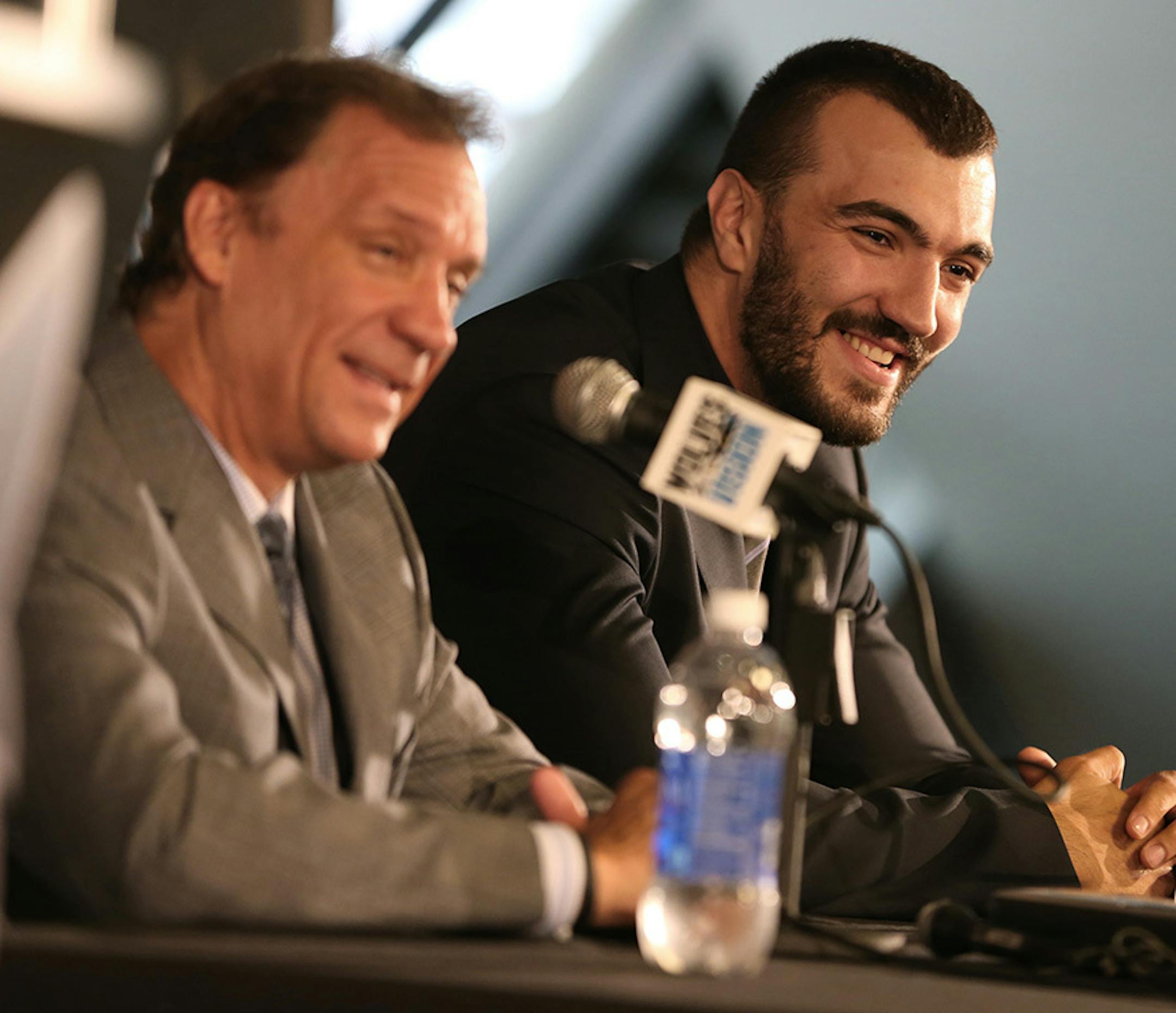 Wolves President of Basketball Operations Flip Saunders and Nikola Pekovic were all smiles at a press conference where it was announced the restricted free-agent was re-signed to a long term deal with the team on 8/16/13.
