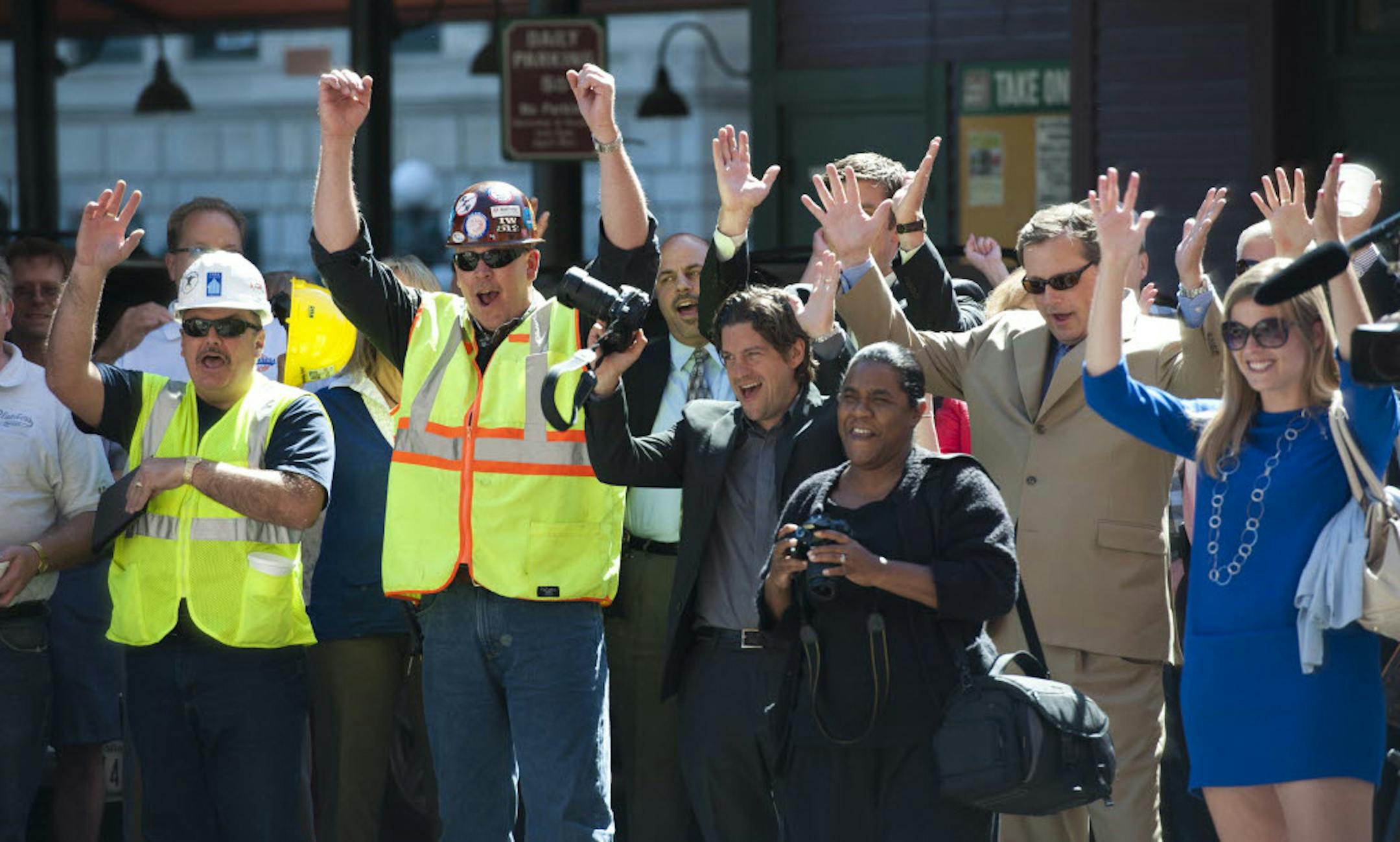 Deputy St. Paul Mayor Paul Williams told the crowd to put their hands in the air and shout "YES" at the announcement of state funding for the new Saints ballpark.