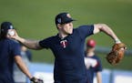 Twins pitcher Trevor Hildenberger warmed up on report day. ] MARK VANCLEAVE &#xef; mark.vancleave@startribune.com * Pitchers and catchers reported to 