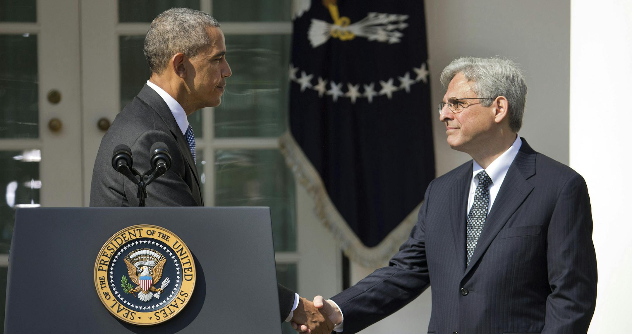 Federal appeals court judge Merrick Garland shakes hands with President Barack Obama as he is introduced as Obama's nominee for the Supreme Court during an announcement in the Rose Garden of the White House, in Washington, Wednesday, March 16, 2016.(AP Photo/Pablo Martinez Monsivais) ORG XMIT: MIN2016031613021039