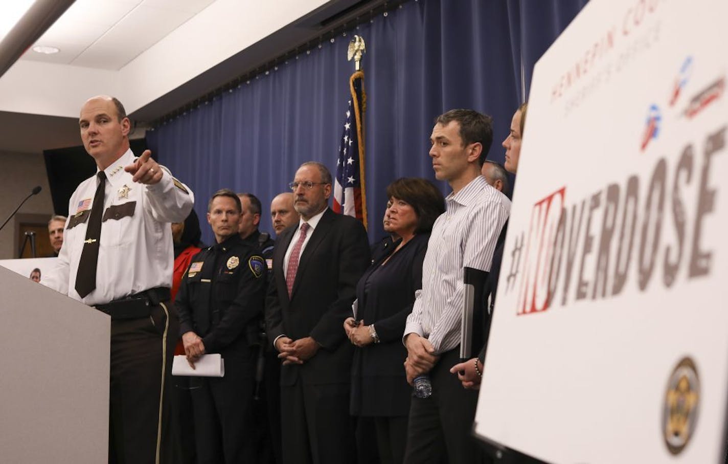 Hennepin County Sheriff Rich Stanek pointed to the logo that symbolizes the year-long anti-opioid campaign "Noverdose" during the news conference Tuesday afternoon.