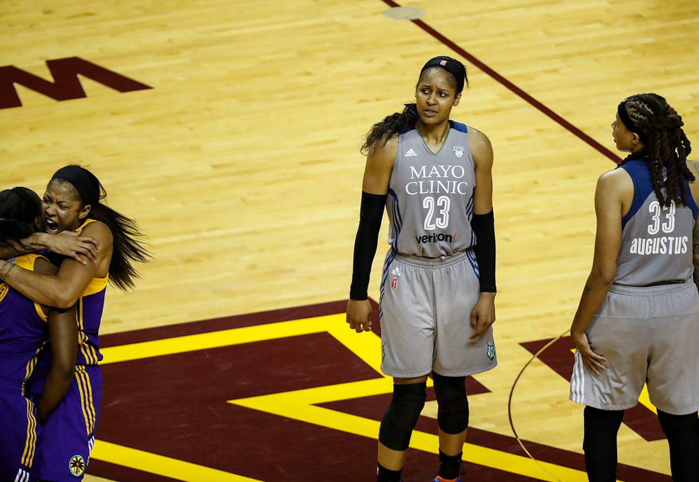 Minnesota Lynx forward Maya Moore (23) and Minnesota Lynx guard Seimone Augustus (33) reacted to a last second loss at the end of the game where L.A. won 85-84.