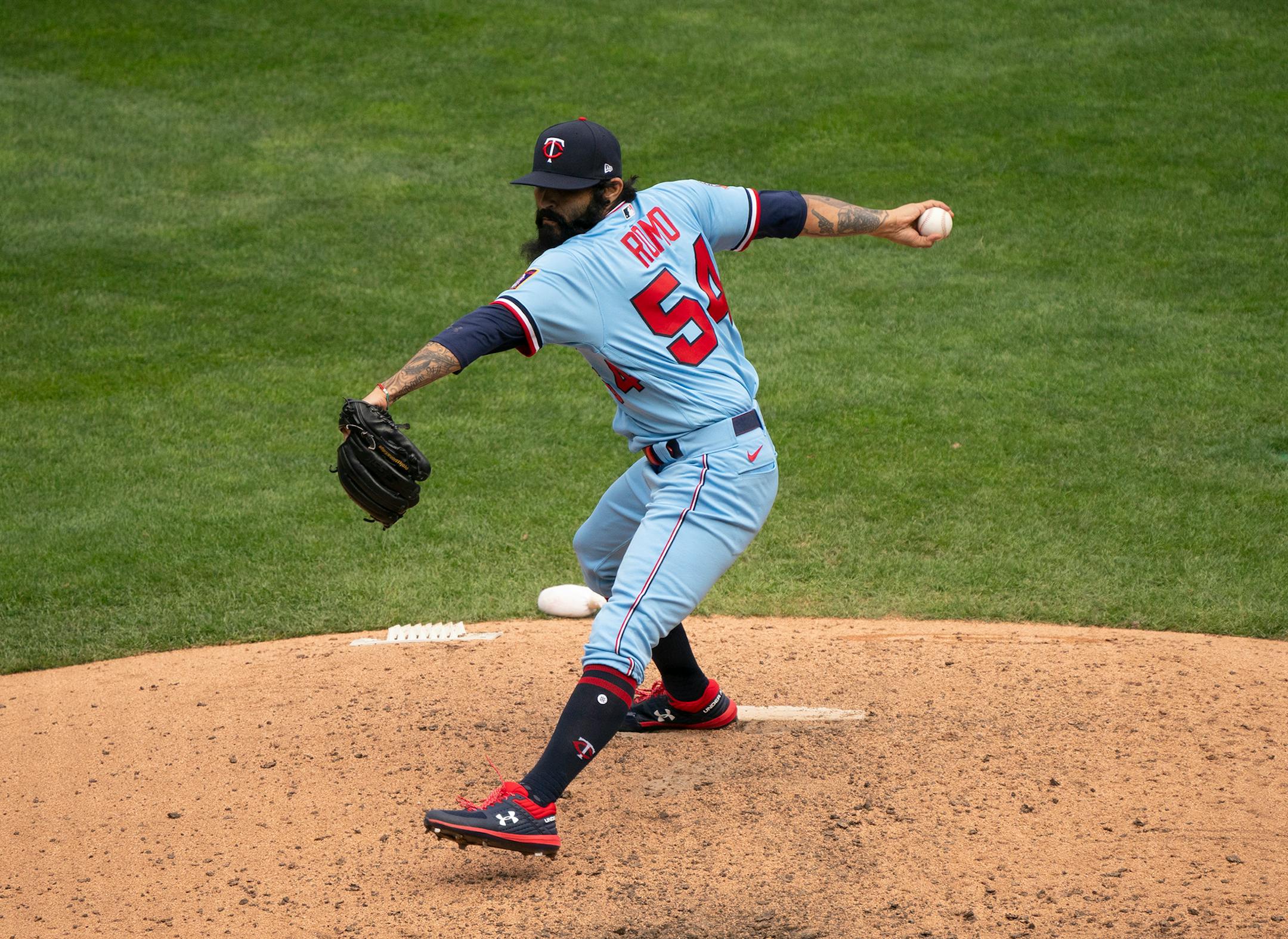 Minnesota Twins closer Sergio Romo (54) throwing the strike to Cleveland Indians first baseman Carlos Santana (41) that ended the game Sunday.
