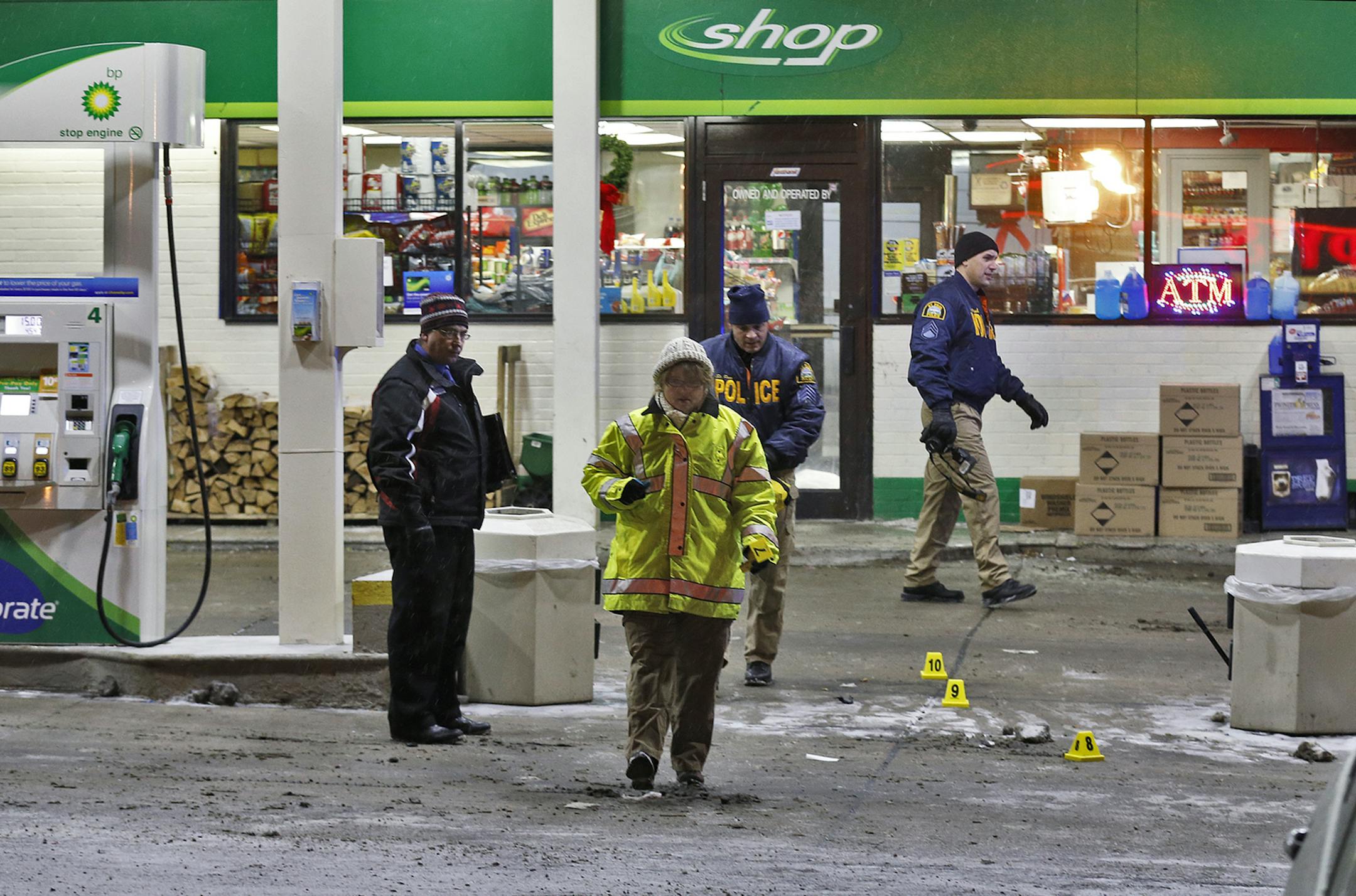 Homicide at gas station - White Bear Ave. and Maryland Ave. St. Paul police investigate in station driveway.