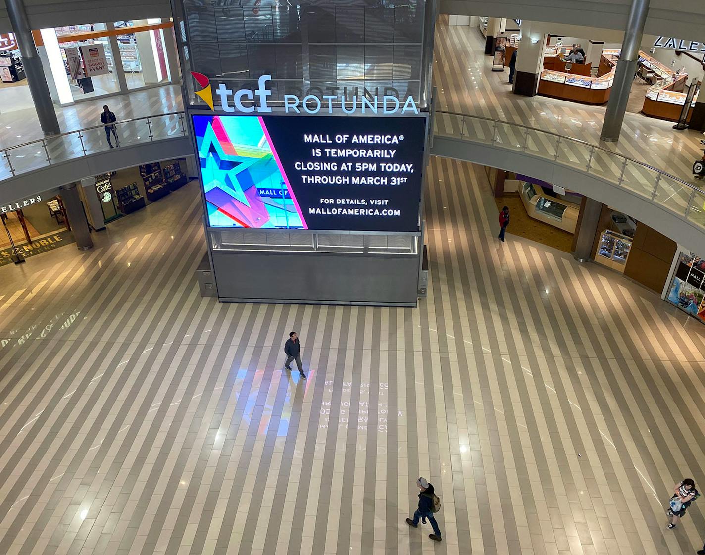 Patrons walk inside the Mall of America on Tuesday, March 17, 2020, shortly before the mall closed temporarily due to concerns over the global coronavirus pandemic.