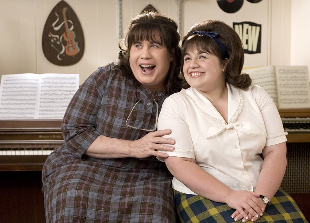 John Travolta as Edna Turnblad and Nikki Blonsky as Tracy Turnblad in the 2007 movie version of “Hairspray.”