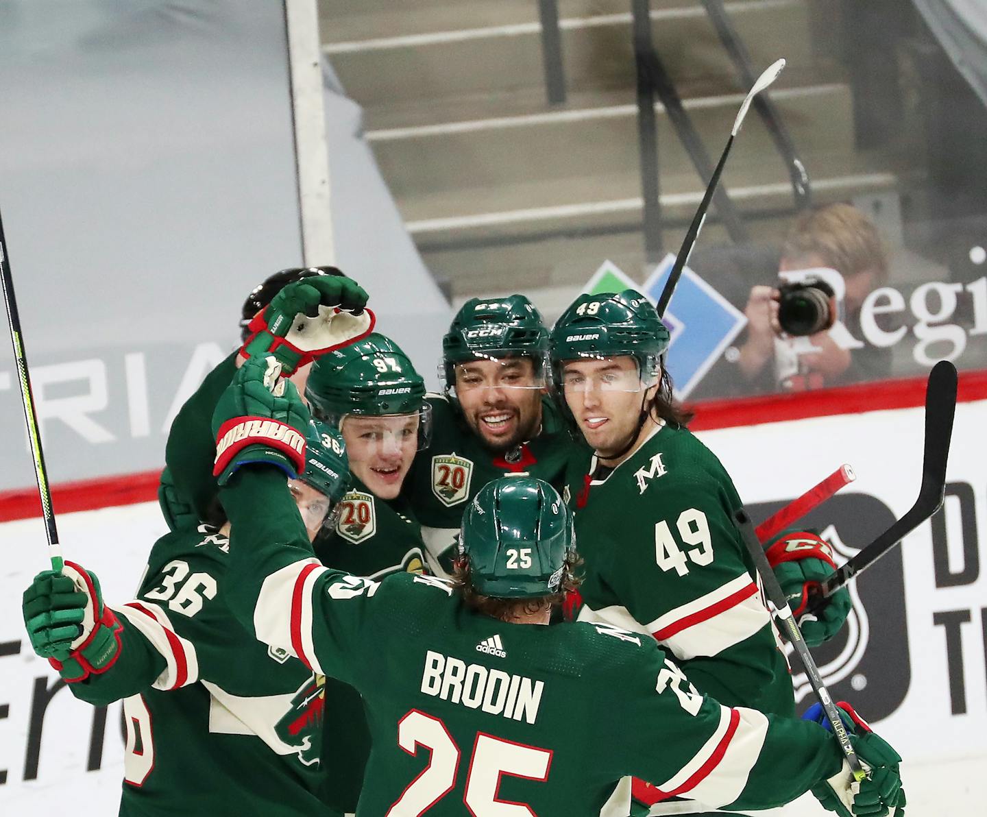 The Minnesota Wild's Kirill Kaprizov (97), second from left, celebrates his first period goal against the LA Kings with teammates during the Wild's 3-1 win. ]