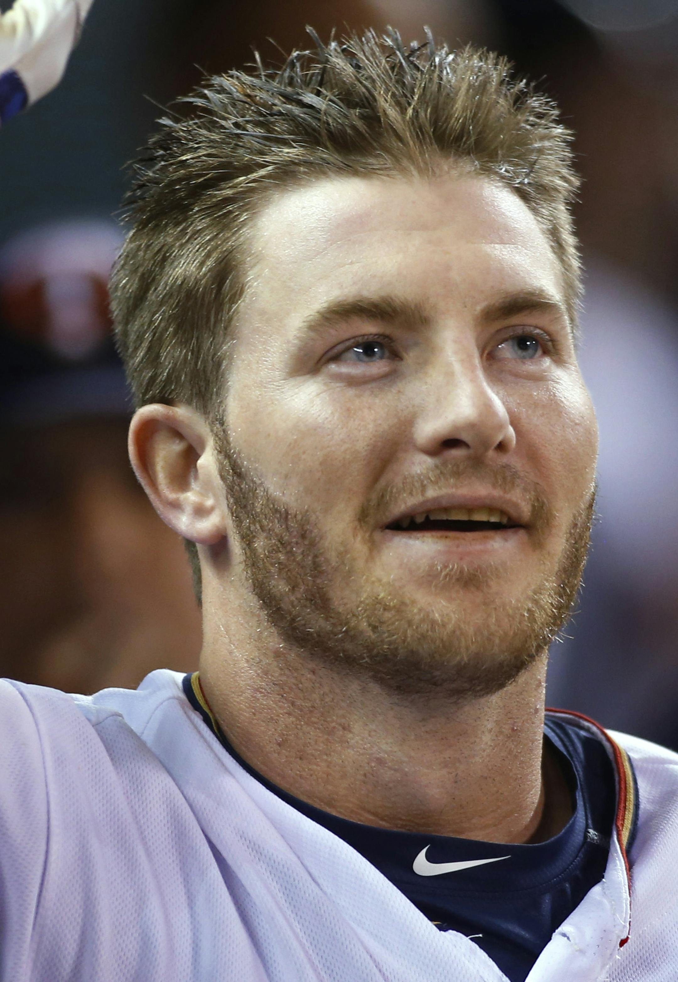 Minnesota Twins' Robbie Grossman celebrates his home run against the Miami Marlins during the eighth inning of a baseball game Tuesday, June 7, 2016, in Minneapolis. The Twins won 6-4 in 11 innings. (AP Photo/Bruce Kluckhohn)