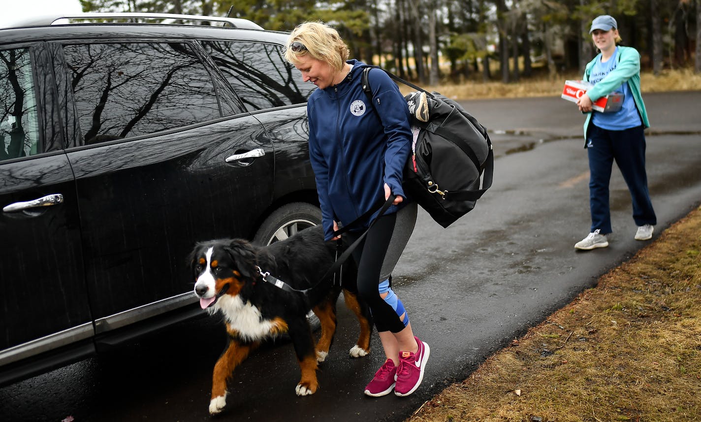 Kelli Briggs and her daughter, Gabby Shaul, 17, brought their belongings inside their home along with their Bernese mountain dog, Koda, 4, Friday morning after the evacuation order was lifted in Superior. ] AARON LAVINSKY &#xef; aaron.lavinsky@startribune.com Evacuees from Superior, Wisc. gathered at the Duluth Entertainment Convention Center following a large industrial fire at the Husky Energy oil refinery Thursday morning. Photographed Thursday, April 26, 2018 in Duluth, Minn.