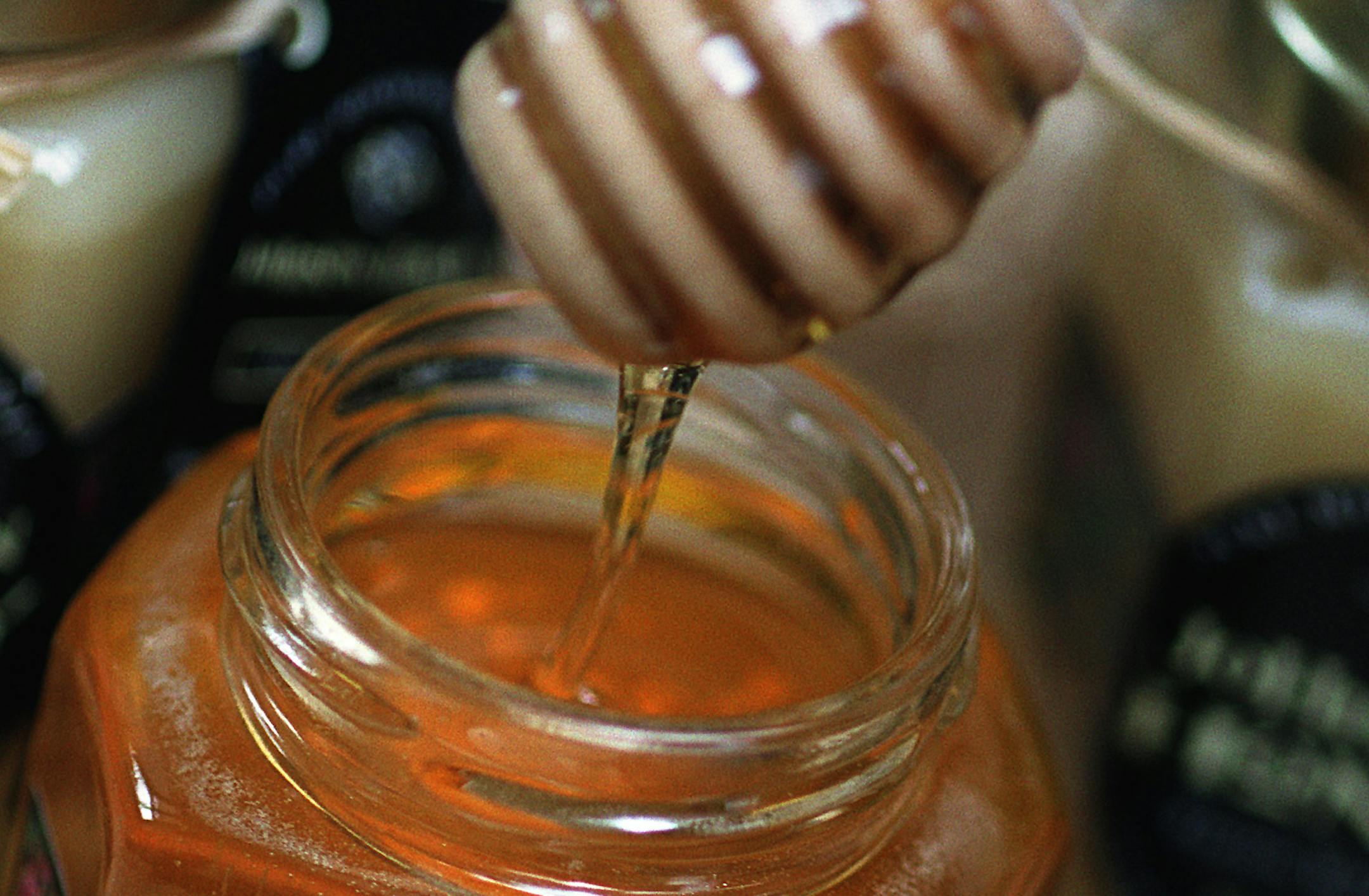GENERAL INFORMATION: Taste: Made in Minnesota: Our first Artisan story on harvesting and making products out of Honey IN THIS PHOTO: TASTE: Bee Farmer Don Johnston and his family make, Johnston Honey. Mayo cardiologist Don Johnston has an unlikely hobby: Beekeeping. He's turned it into a small industry, making honey and honey-related products and selling it in Rochester and the Twin Cities. Bees Flowers and Family at the Johnston house in Rochester, MN ORG XMIT: MIN2013102314515357