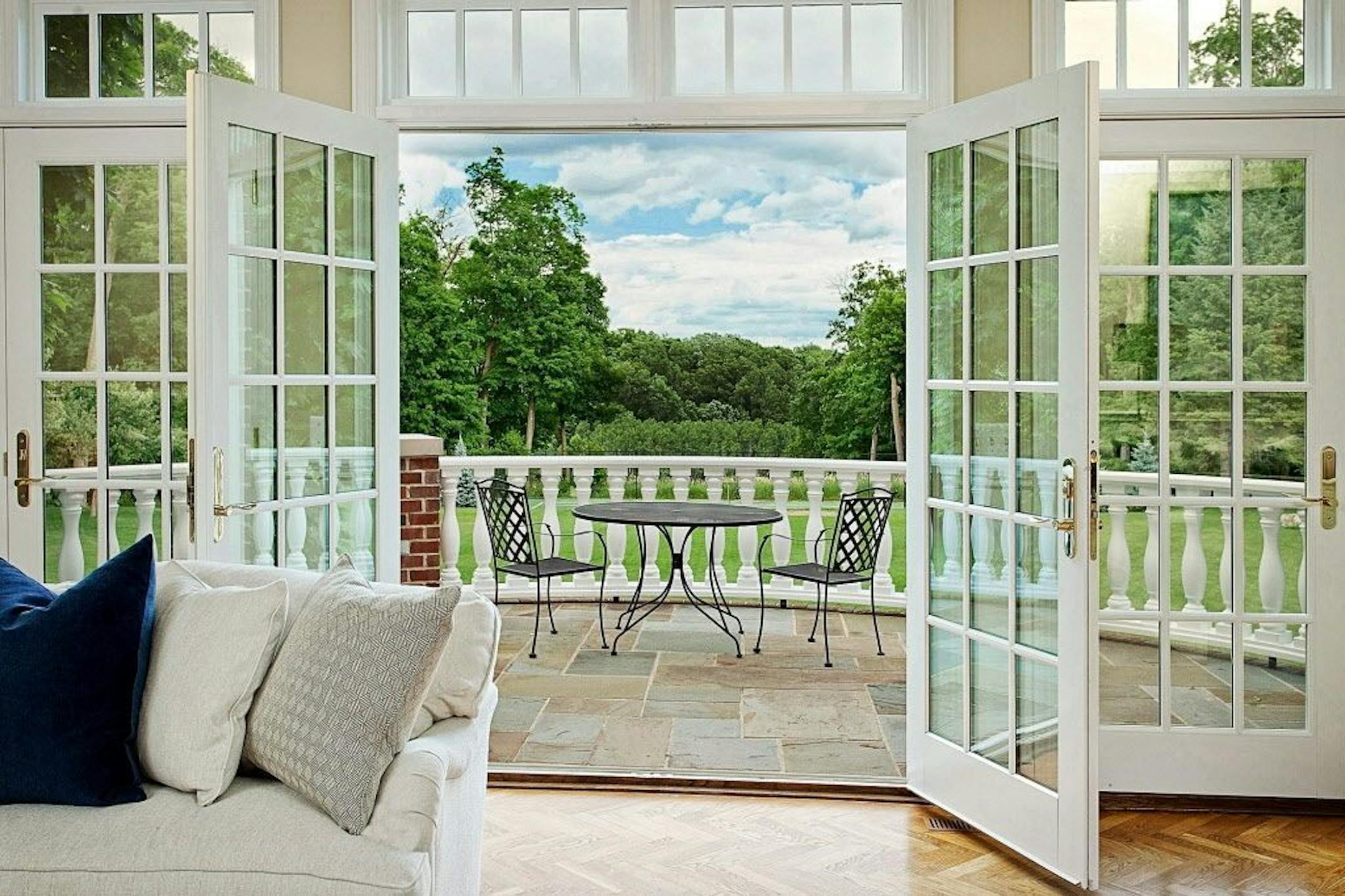 Many of the rooms step out to the bluestone terrace.