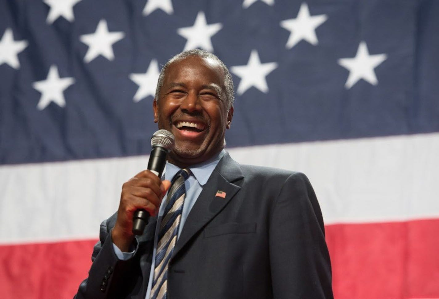 Presidential candidate Dr. Ben Carson smiles as he is cheered at a rally at the Anaheim Convention Center Arena in Anaheim, California on Wednesday, Sept. 9, 2015.