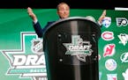 NHL Commissioner Gary Bettman reacts as hockey fans boo him during the NHL hockey draft in Dallas, Friday, June 22, 2018. (AP Photo/Michael Ainsworth)