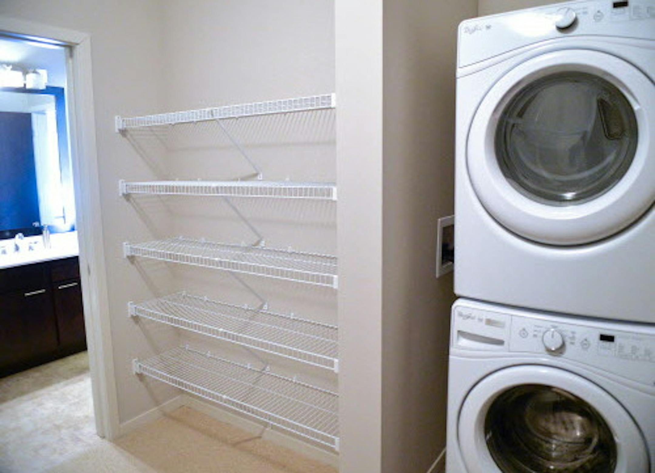 The Paxon offers secure storage spaces with each parking space in its two-level heated underground parking garage and walk-in closets with washer and dryer in each unit. ] (SPECIAL TO THE STAR TRIBUNE/BRE McGEE) **The Paxon