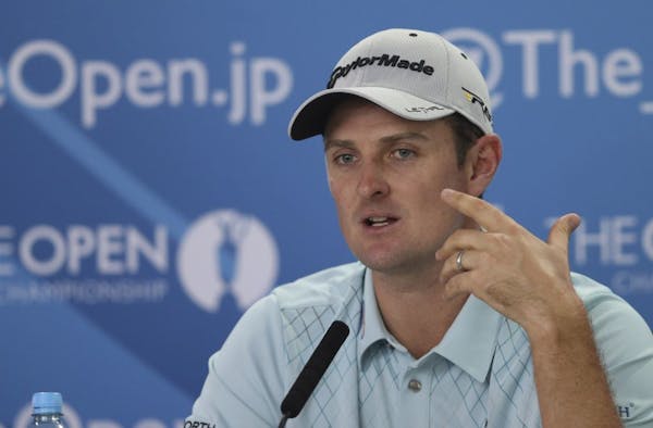 Justin Rose talks during a press conference ahead of the British Open Golf Championship at Muirfield, Scotland, Wednesday July 17, 2013.